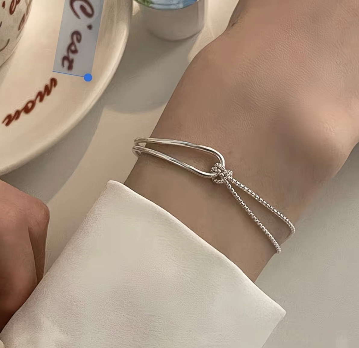 دستبند نقره عیار ۹۲۵ مدل نیم النگو گره دار طرح ۲۰۲۶ کد۱۰۱